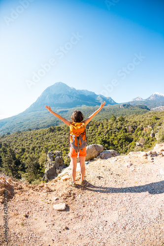 Girl at the top of the mountain.