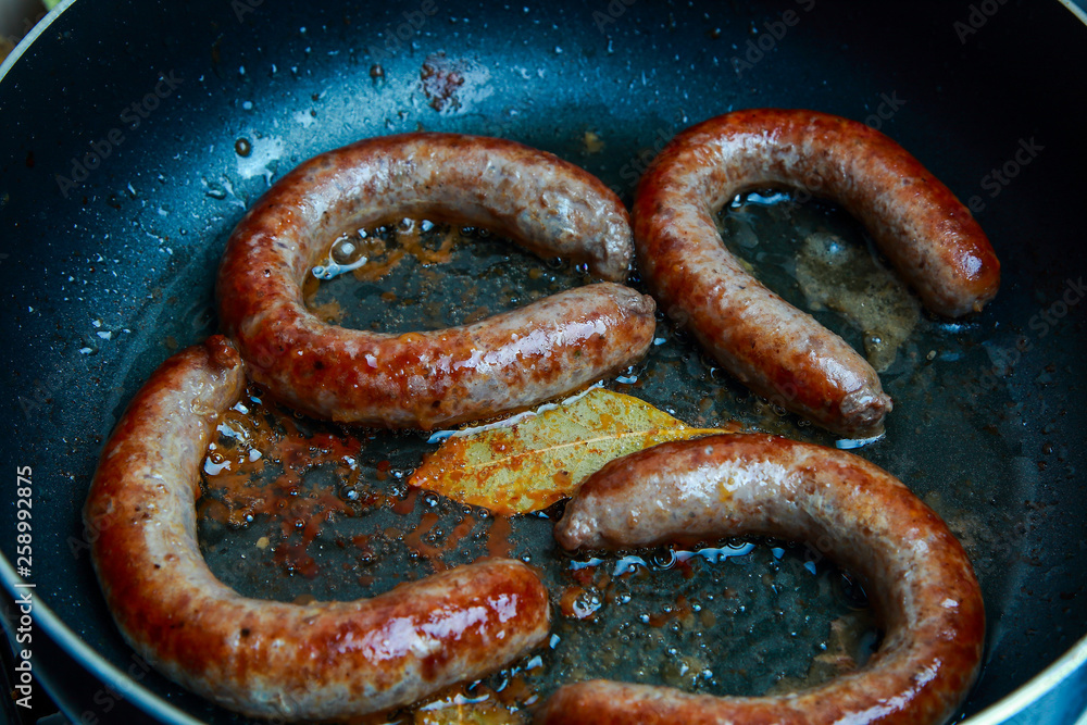 grilled beef sausages with a golden crust grilled beef sausages with a golden crust