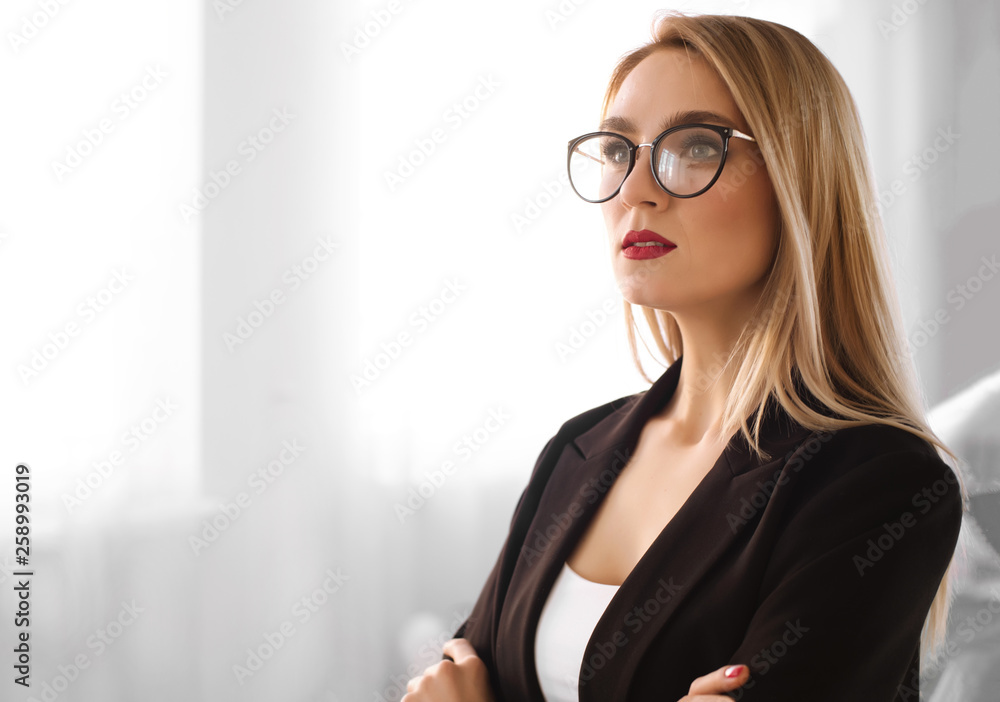 business glasses style and people concept. Close up photo of serious blonde businesswoman with red lipstick in glasses student or secretary in eyeglasses near window indoor Stock Photo Adobe Stock