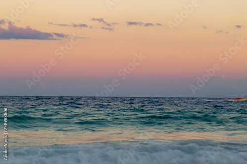 Sunrise over the beach of the Mayan Riviera in Tulum, Quintana Roo, Mexico