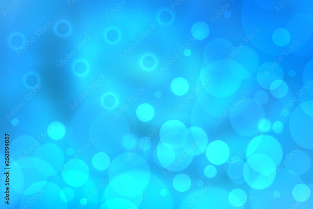 Blue abstract shiny blurred background texture with circular bokeh lights. Beautiful backdrop.