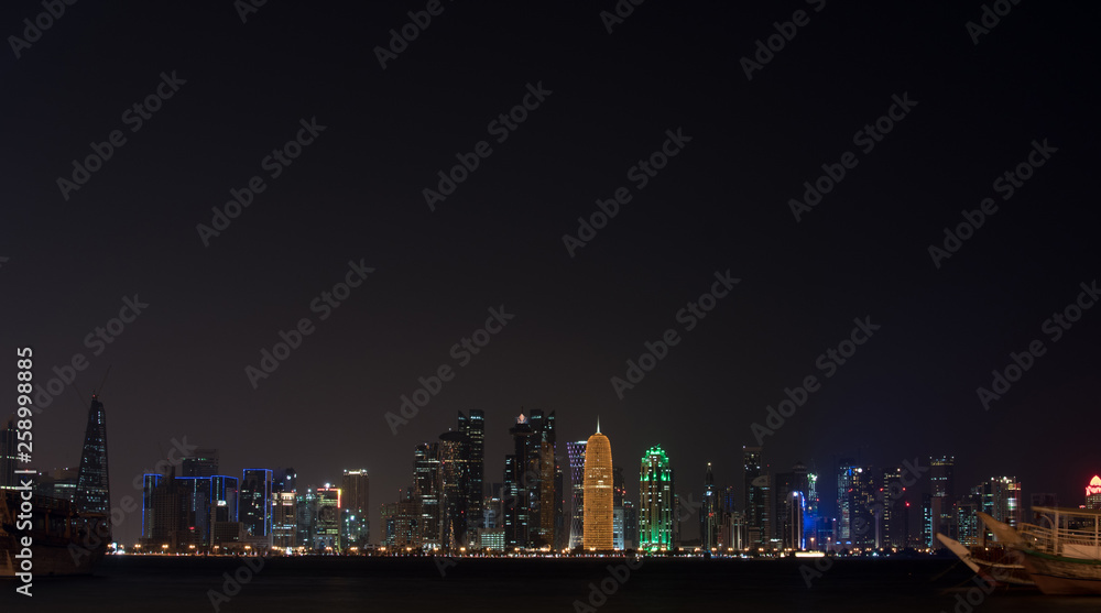 Doha city skyline night view, Qatar. view of the night city. free palce for text. night sky, high-rise buildings, luxury luminous buildings