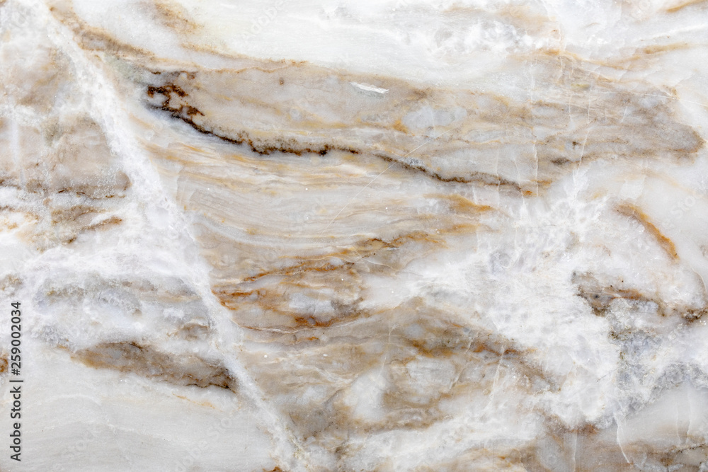 Closeup surface of marble pattern at the marble floor texture background , yellow abstract marble pattern Closeup surface of marble pattern at the marble floor texture background , yellow abstract marble pattern