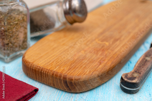 Wooden oak cutting board. Kitchenware. Copy space. © sandipruel