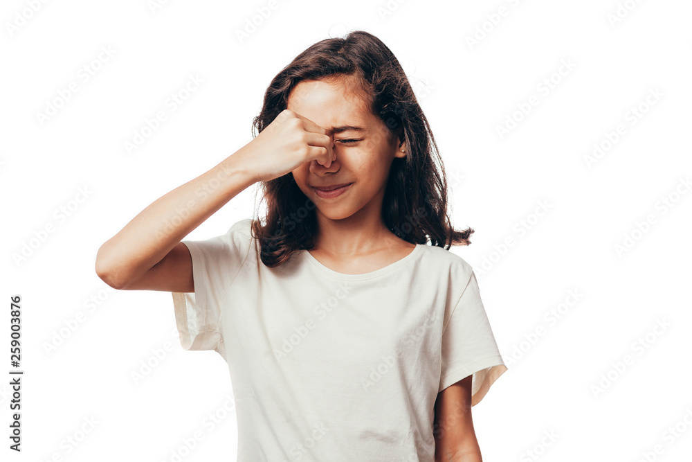 Sinus pain, sinus pressure, sinusitis. Sad child holding her nose and head because sinus pain Sinus pain, sinus pressure, sinusitis. Sad child holding her nose and head because sinus pain