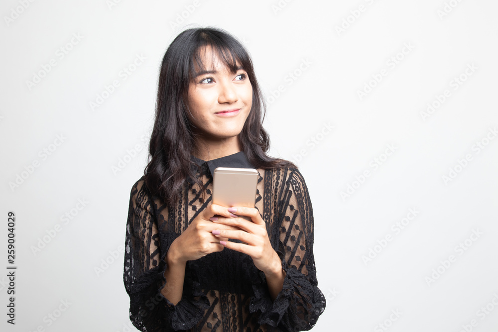 Young Asian woman with mobile phone. Young Asian woman with mobile phone.