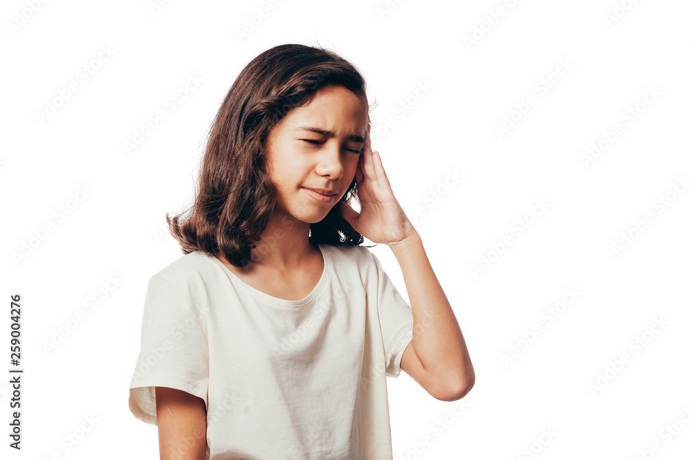 Portrait of an annoyed girl suffering from a headache isolated over white background Portrait of an annoyed girl suffering from a headache isolated over white background