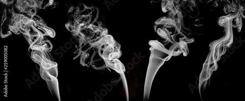 four white smokes set on black background , graphic ressource .