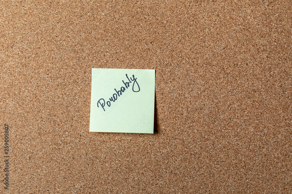 green sticker on brown table. color sticker, motivational, quote and words, note, message green sticker on brown table. color sticker, motivational, quote and words, note, message