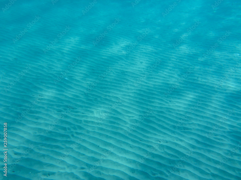 Underwater view of the beautiful Skala beach of Kefalonia island, Ionian sea, Greece.