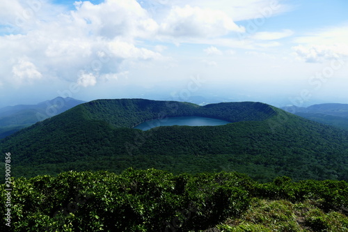 View of Onami Ike from top of Mt. Karakunidake, highest mountain in Ebino kogen area, Kyushu, Japan photo