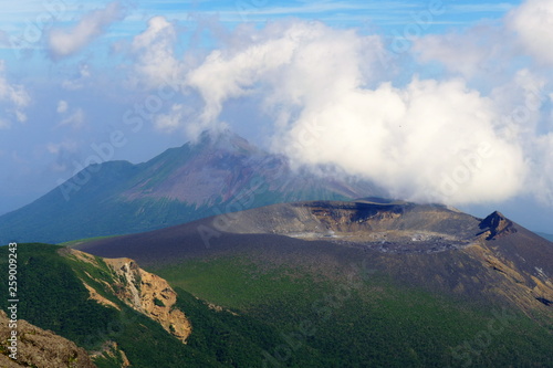 Shinmoe-dake and Takachiho-no-mine volcano ridge seen from Karakuni-dake  Ebino kogen  Japan