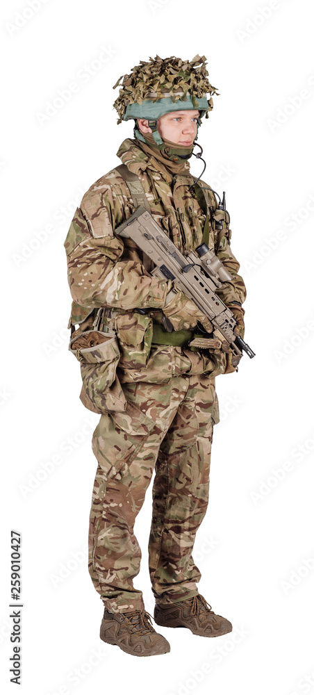 set image of modern british soldier with rifle on white background . army, military and people concept set image of modern british soldier with rifle on white background . army, military and people concept