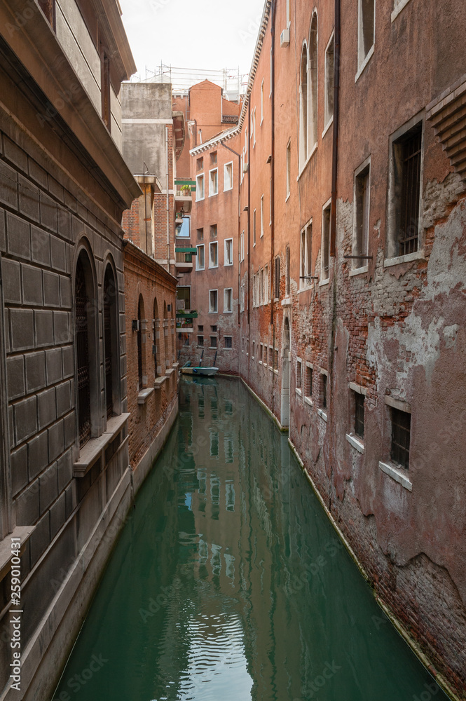 Venice empty channel between buildings
