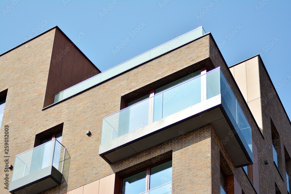 Fragment of a modern apartment building in front. Very modern apartment house.