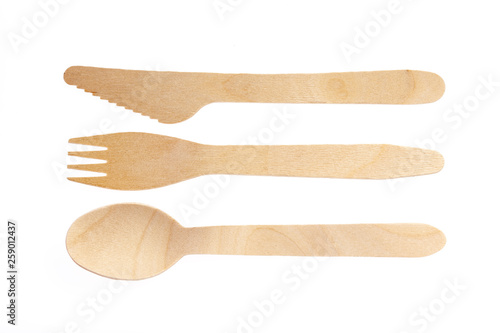 Eco-friendly materials. Wooden, disposable tableware on a white background.