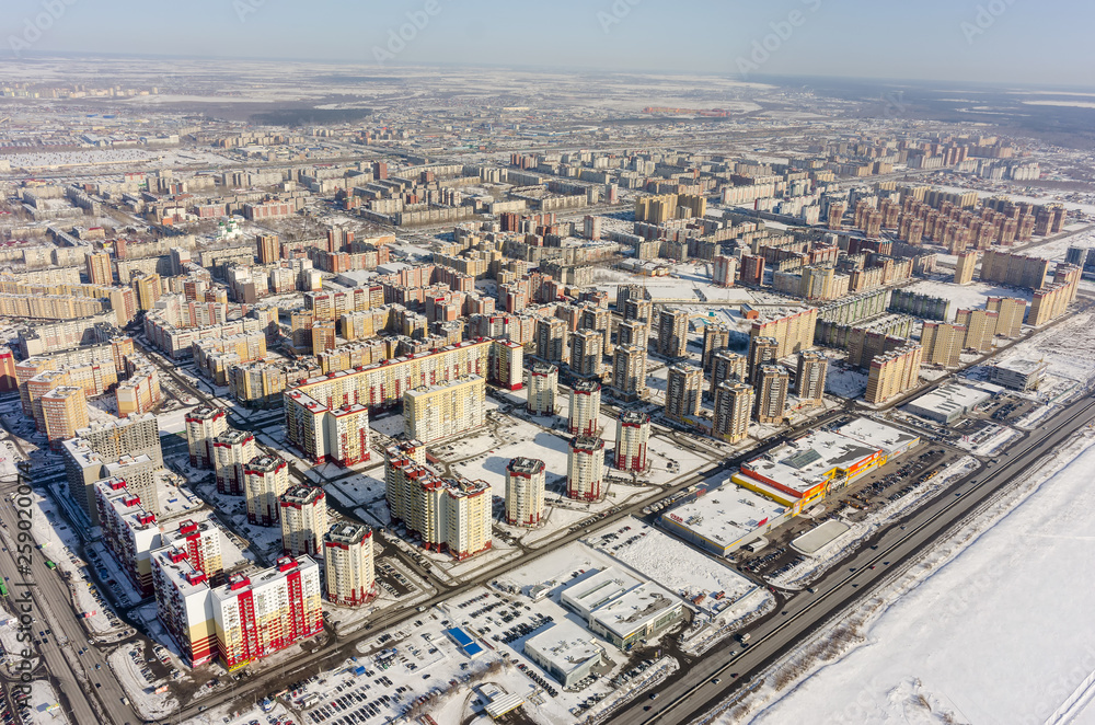 Residential area over city plant background.Tyumen