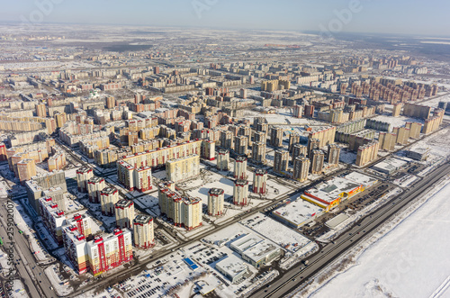 Residential area over city plant background.Tyumen