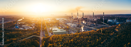 Valokuva industrial landscape with heavy pollution produced by a large factory