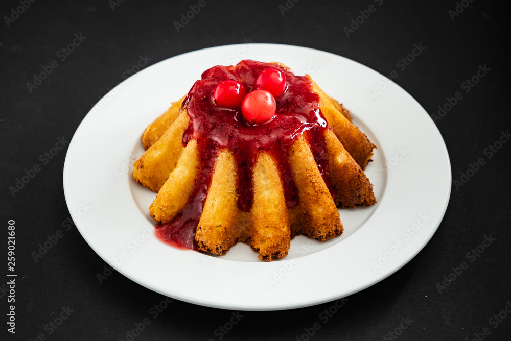 cake with berry sauce cake with berry sauce