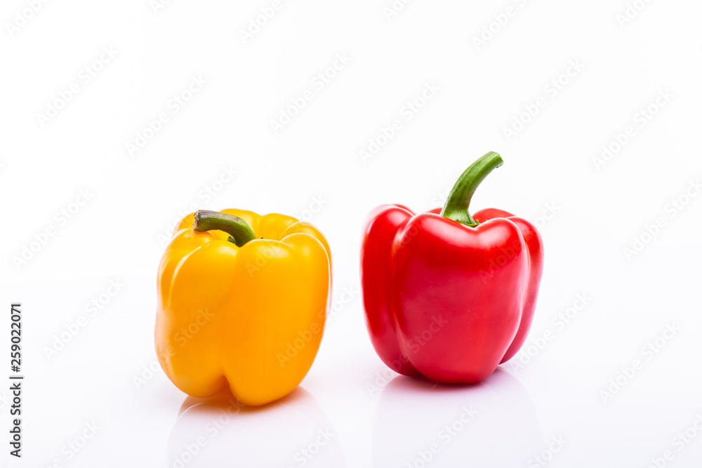 Yellow and red pappers isolated on white background Yellow and red pappers isolated on white background