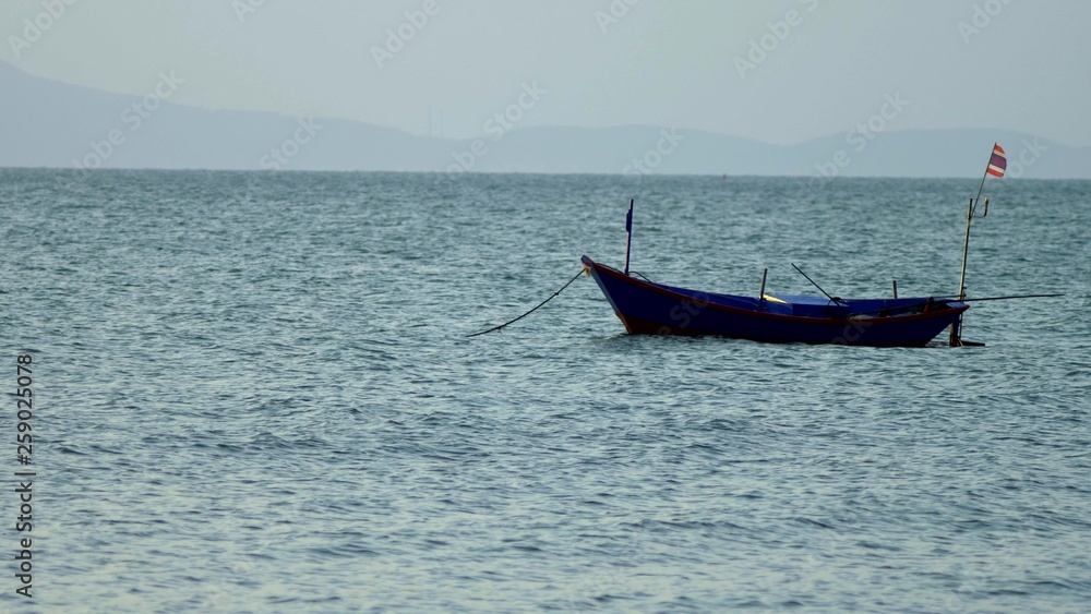 traditional Thai longtail boat in the sea.