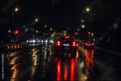 Car traffic at night on the avenue