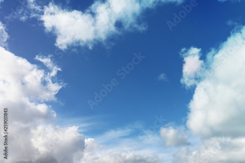 Heavenly clouds during a sunny day. Perfect to write something in the middle at the copy space.