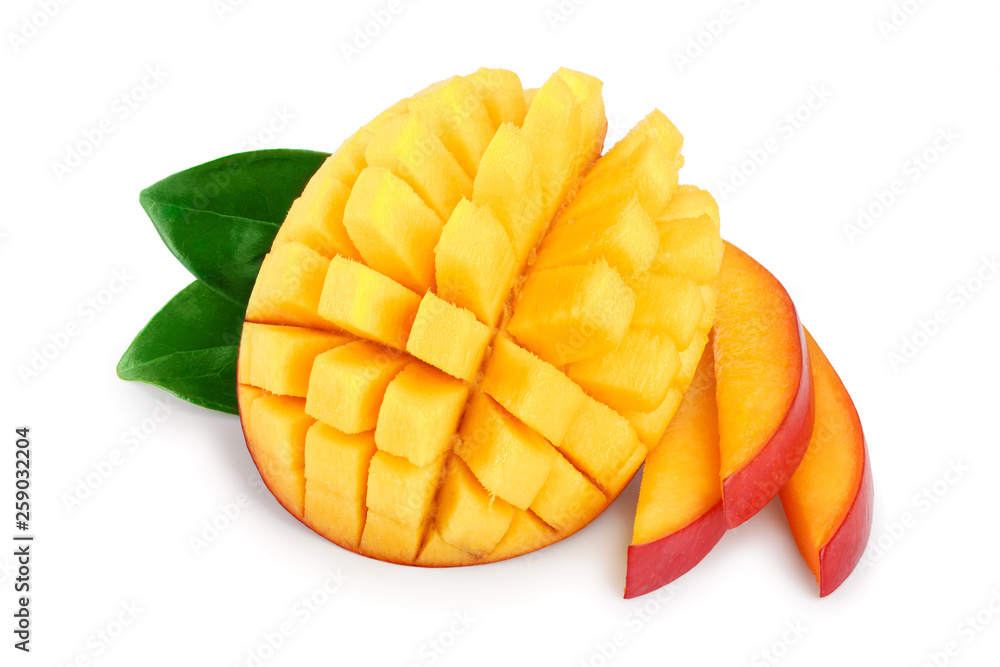 Mango fruit half with leaves and slices isolated on white background close-up