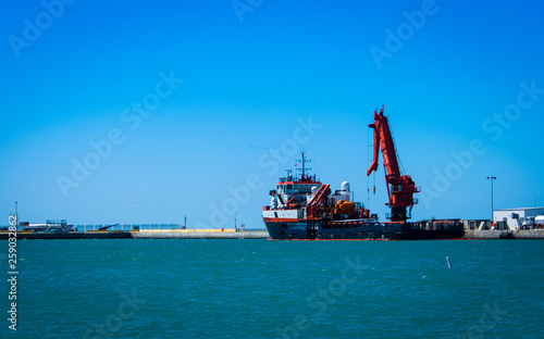 Industrial crane ship at dock in Key West Harbor