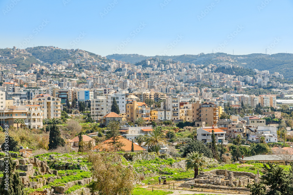 Mediterranean city historic center panorama with ruins and residential buildings in the background, Biblos, Lebanon