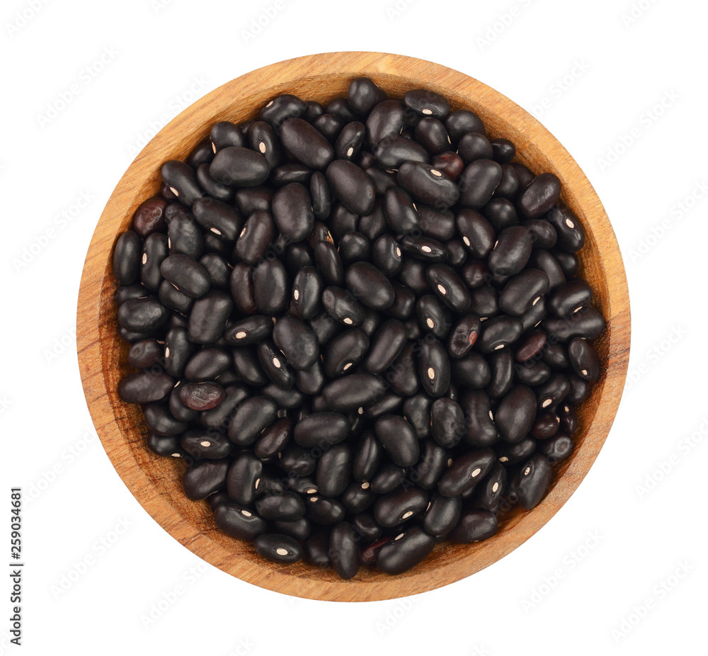 black kidney bean in wooden bowl isolated on white background. Top view. Flat lay black kidney bean in wooden bowl isolated on white background. Top view. Flat lay