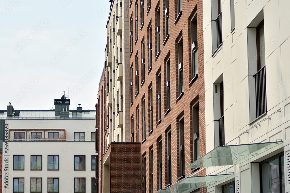 Fragment of a modern apartment building in front. Very modern apartment house. Fragment of a modern apartment building in front. Very modern apartment house.