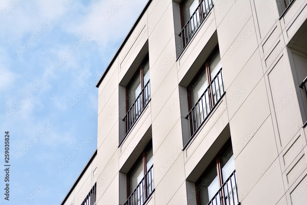 Fragment of a modern apartment building in front. Very modern apartment house. Fragment of a modern apartment building in front. Very modern apartment house.