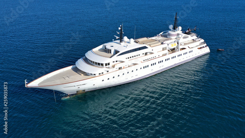 Aerial drone photo of luxury mega yacht docked in tropical open ocean sea © aerial-drone