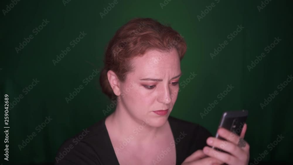 Unhappy Beautiful Woman Texting on Mobile,