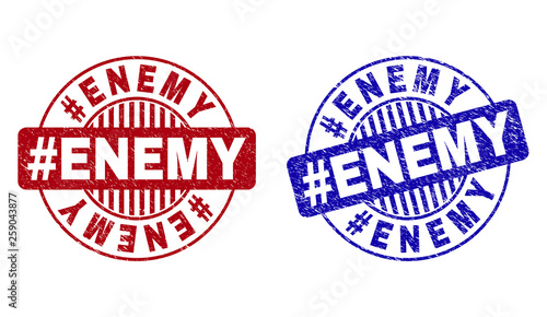 Grunge #ENEMY round stamp seals isolated on a white background. Round seals with distress texture in red and blue colors. Vector rubber imitation of #ENEMY text inside circle form with stripes.