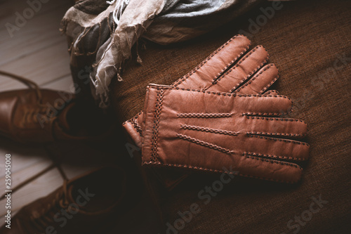 closeup brown leather gloves