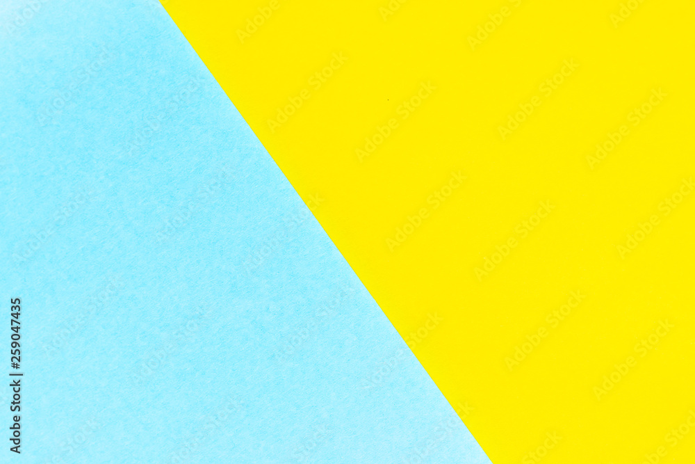 Abstract yellow and light blue color paper textured background with copy space for design and decoration Abstract yellow and light blue color paper textured background with copy space for design and decoration