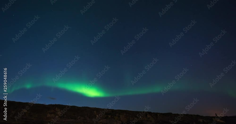 Timelapse of northern lights with beautiful landscape in view Timelapse of northern lights with beautiful landscape in view
