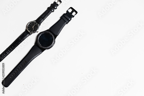 Top view women and man watch on flat lay