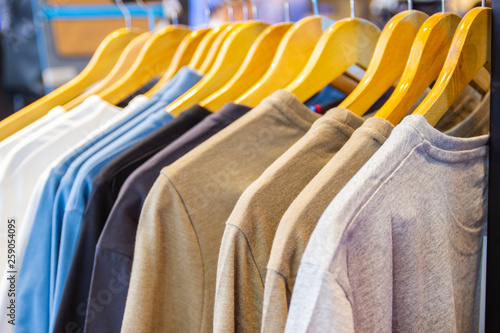 Colorful t-shirt on hangers for sale in department stores.