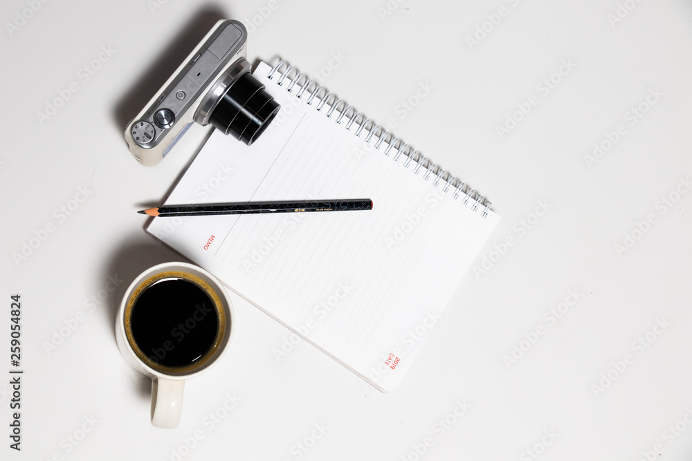 Top view coffee and camera notebook on Flat lay Top view coffee and camera notebook on Flat lay