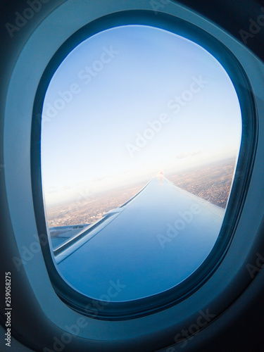 airplane window and wing
