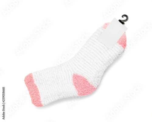 Pink Socks with blank label on white background. Winter sock made from soft fabric.