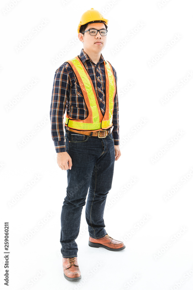 Engineer man standing orange helmet and vest Engineer man standing orange helmet and vest