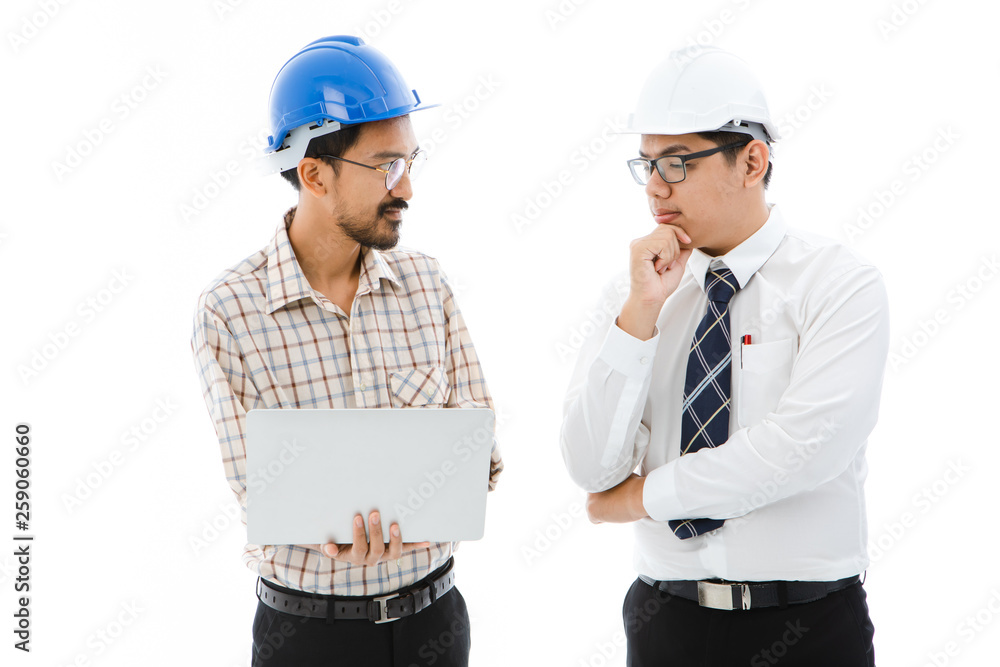 Two Engineer man blue helmet notebook consult Two Engineer man blue helmet notebook consult