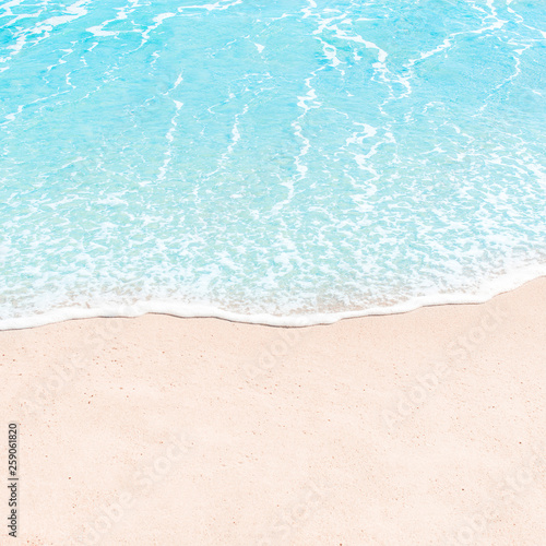 Soft wave of blue ocean on sandy beach. Summer Background. Copyspace © nataliazakharova