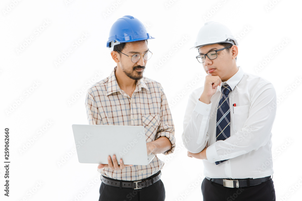Two Engineer man blue helmet notebook consult Two Engineer man blue helmet notebook consult