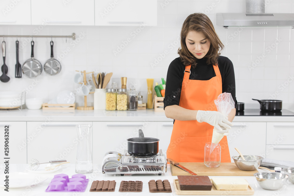 Woman making chocolate Woman making chocolate